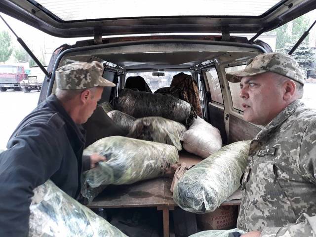 Отримання тернопільських маскувальних сіток бійцями